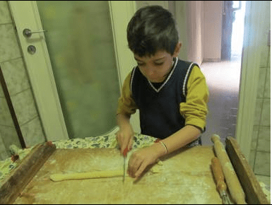 Making strufoli during Christmas. 