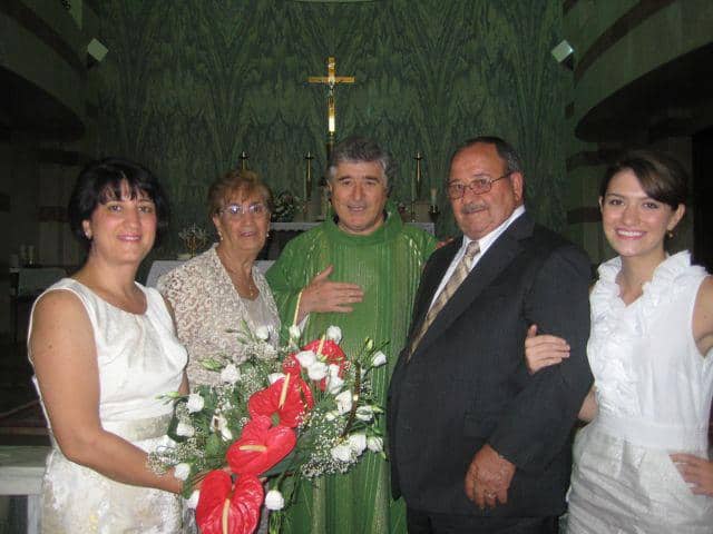 Celebrating the 50th Wedding Anniversary of her grandparents in Ateleta, Italy (L to R: Mother, Sandy Colaizzi - Grandmother, Irma Colaizzi (Priest from Ateleta), Grandfather, Elio Colaizzi, Tinamaria Colaizzi 